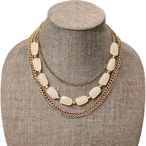 Sophia's Golden Elegance: A Four-Layered White Stone Bead Statement Necklace - Picture 3 of 10